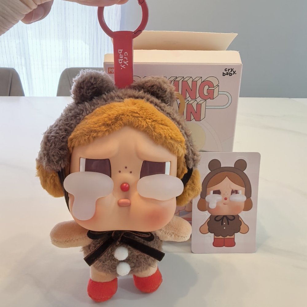 Crying Baby Plush Toy with Red and Brown Features